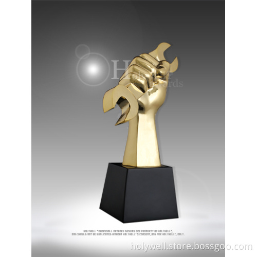 Unique Custom Golden Wrench Award with a Shiny Effect for Ceremony Use